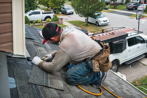 Professional Roofing technician working in Tidewater, OR